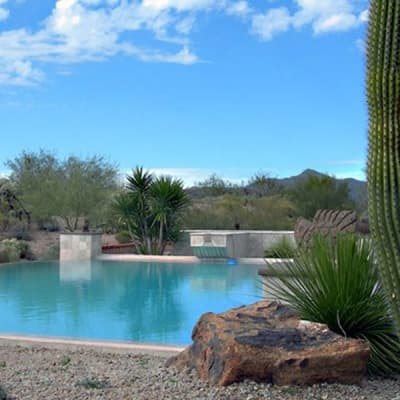 Infinity-edge pool in an Arizona desert landscape